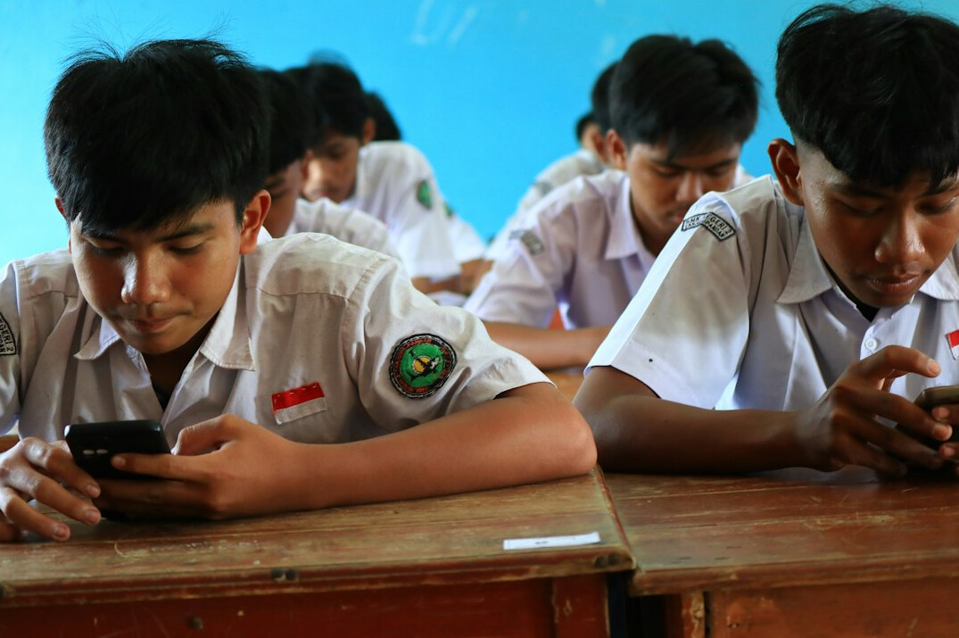 diverse students in modern classroom